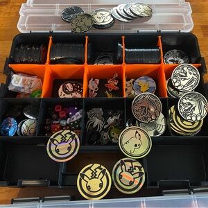 Pokémon Coins, pins and more TCG dice carrying case
